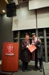 Prof Nelson Chow receiving a souvenir from College Master, Prof Kenneth Young